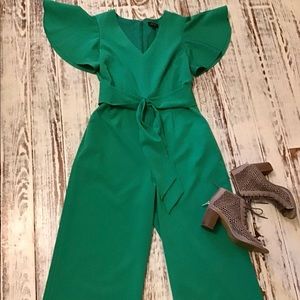Classy cropped jumpsuit, just like new. Beautiful jade green color. Size 12.